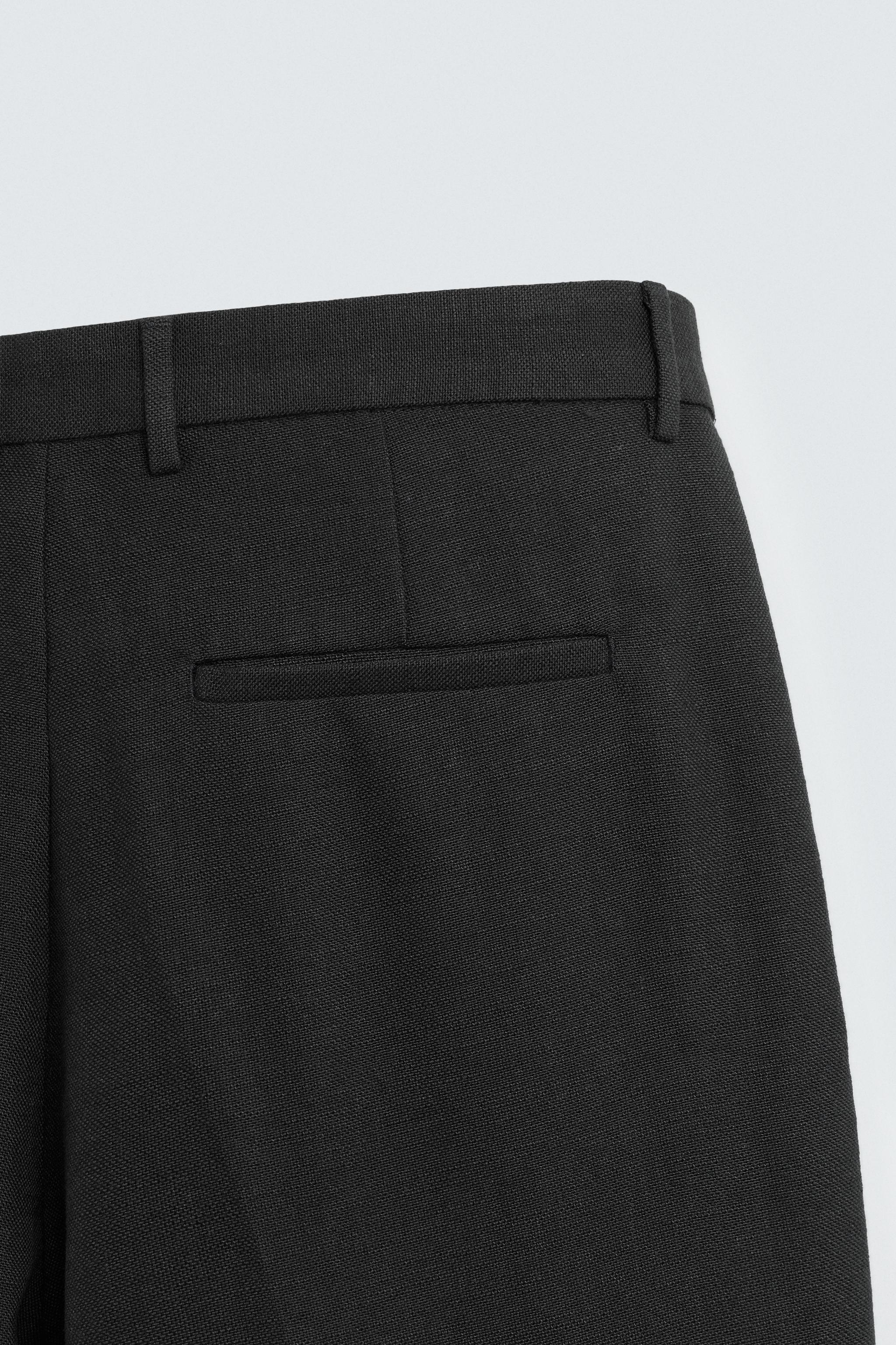 PLEATED RELAXED FIT PANTS